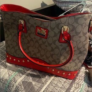 Super cute Coach purse. Used once. Has a long strap never been used.